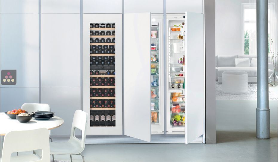 Multi-purpose wine cabinet for the storage and service of wine - can be fitted - White glass door.
