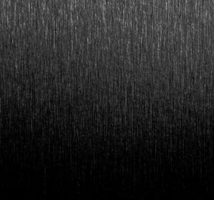 Wooden cladding covered with a satin black finish laminate