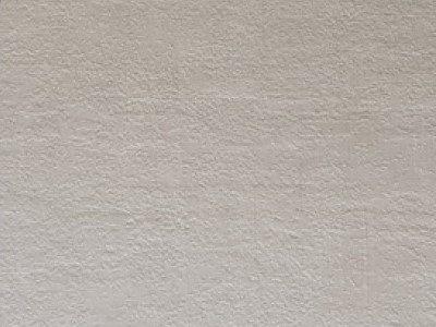 Wooden cladding covered with a Dove-grey concrete finish laminate