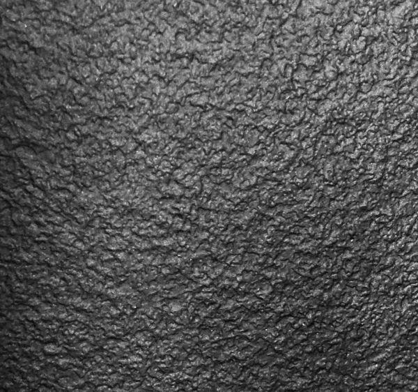 Cladding covered with a textured Black finish laminate