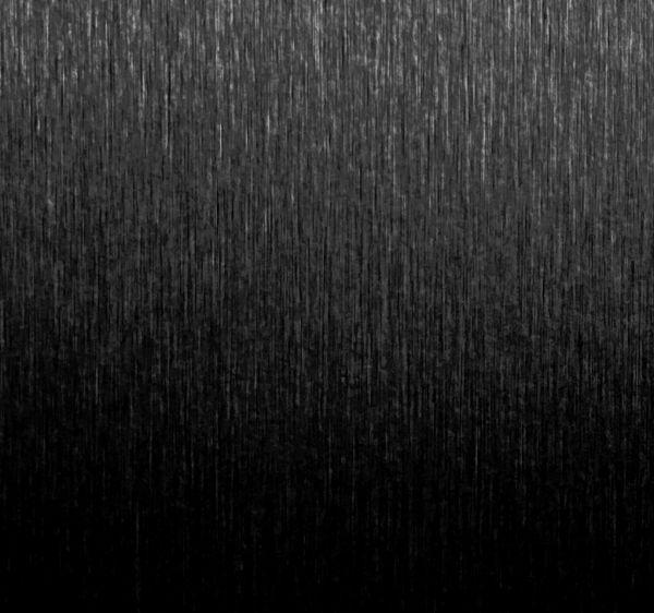 Wooden cladding covered with a satin black finish laminate